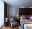 Les meubles adaptés aux besoins du client de chambre à coucher d'hôtel placent le contreplaqué du lit E1 de placage de noix